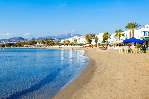 View of the beautiful Agios Georgios city beach or Saint George beach and its facilities, Naxos Island, Cyclades Islands, Greece