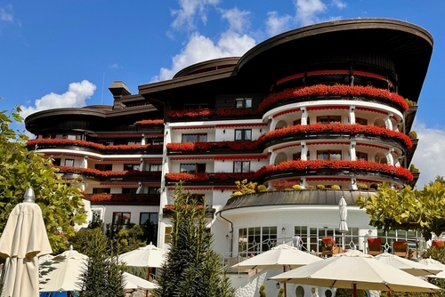 A view of a flowered facade of chic Hotel Bareiss in Baiersbronn in the Black Forest, Baden-Württemberg, Germany