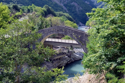Landscape with old and new bridge over Arachtos river in the National Park of Tzoumerka, Peristeri, Arachthos Gorge and Acheloos valley, Epirus, Greece