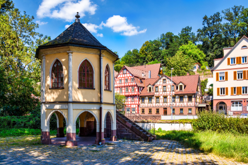 Pavilion and half-timbered houses on the Nagold shore in Calw in the Black Forest, Baden-Württemberg, Germany