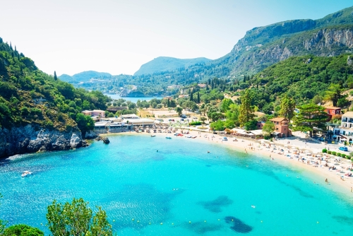 Magnificent view of Paleokastritsa beach bay and its facilities on the Island of Corfu, Ionian Islands, Greece