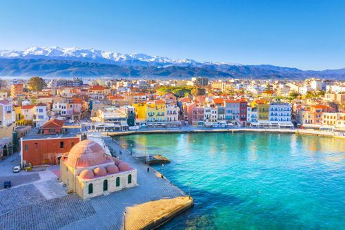 Aerial view of Chania with the amazing lighthouse, mosque, venetian shipyards, Island of Crete, Greece