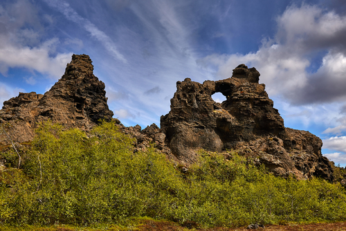 Dimmuborgir, a large area of unusually shaped lava fields, east of Myvatn, Iceland. The Dimmuborgir area is composed of various volcanic caves and rock formations