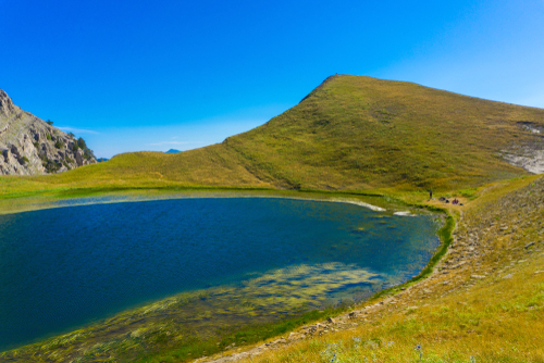 Tymfi Dragon lake (drakolimni) in the reserve area of the North Pindus Range of the Gamila crest (Tymfi’s highest peak). There are legendary tales that mythical creatures once inhabited the lake, Zagori, Epirus, Greece