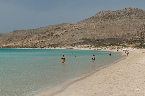 View of people bathing at Simos Beach on the Ionian Sea, Elafonisos island, Laconia, Peloponnese, Greece