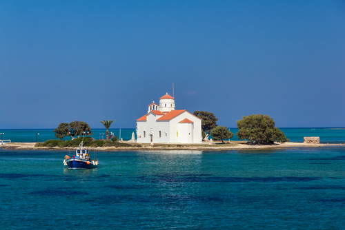 View of the church Saint Spiridon at the Entrance to the port of Elafonisos, Laconia, The Peloponnese, Greece