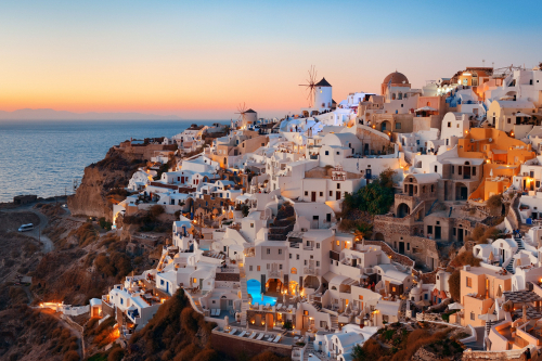 Santorini skyline Sunset with windmill and buildings, Cyclades Islands, Greece