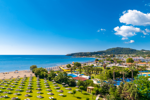 View of the Faliraki Beach, a primary seaside resort village on the Island of Rhodes, Greece