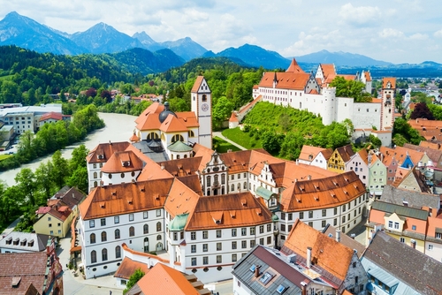 Hohes Schloss Fussen or Gothic High Castle of the Bishops and St. Mang Abbey monastery aerial panoramic view in Fussen, Bavaria, Germany