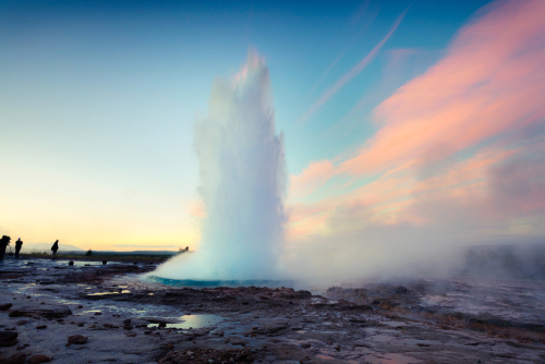 Geysir (The Great Geysir) erupting, a geyser in Haukadalur valley on the slopes of Laugarfjall hill, Golden Circle, southwestern Iceland