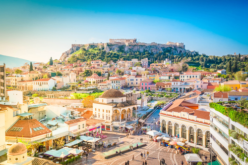 Dramatic skyline of the city of Athens with Moanstiraki square and Acropolis hill, Athens, Greece