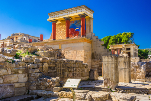 Old walls of Knossos palace near Heraklion, Crete island, Greece. The ruins of the Minoan palace is the largest archaeological site of all the palaces in Mediterranean island of Crete