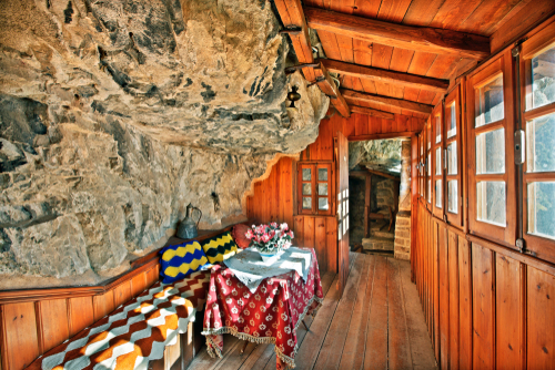 Inside the holy monastery of Kipinas, hanging from a cliff in Tzoumerka mountainous region, Ioannina, Epirus, Greece