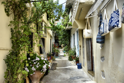 Traditional Cretan village of Kritsa with narrow alleys and houses with bougainvilleas, near Agios Nikolaos, Crete Island, Greece