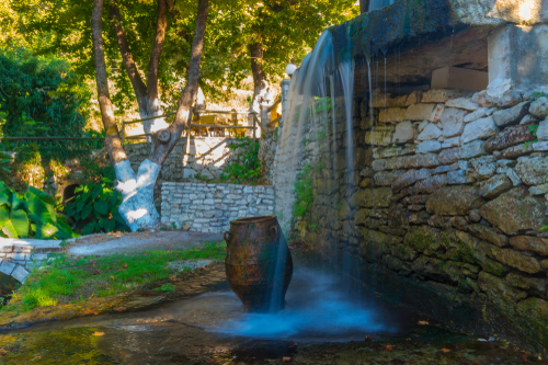 View of a waterfall in the village of Argiroupolis, near Chania, Island of Crete, Greece
