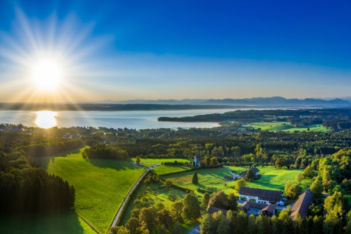 Lake Starnberg on a clear Sunny day in front of the Alps, seen from Ilkahöhe, Tutzing, Fünfseenland, Bavaria, Germany