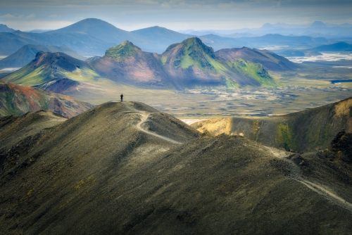 A hiker on a trail in Landmannalaugar, Highlands, Iceland