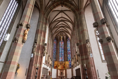 Interior view of the nave and altar of the 14th century Maria Chappel, a Roman Catholic church at the Unterer Markt square in the Bavarian town of Wurzburg, Bavaria, Germany