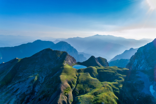 Drakolimni of Tymfi, the lake resides at an altitude of 2050m above sea, in Vikos National Park in Zagori, Greece. At 5 hours walking distance from the village of Papingo, a popular trekking destination