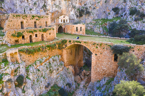 Exterior view of the ruins of the Katholiko Monastery (church of St John the Hermit), near Gouverneto Monastery, near Chania, Island of Crete, Greece