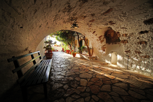 Interesting detail of a courtyard inside the monastery of the virgin Mary in Paleokastritsa, on the Island of Corfu, Greece