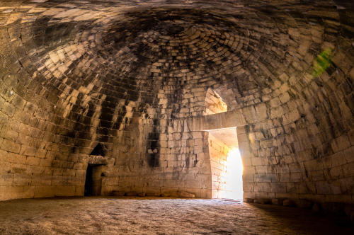 The archaeological site of Mycenae near the village of Mykines, with ancient tombs, giant walls and the famous lions gate, the Peloponnese, Greece