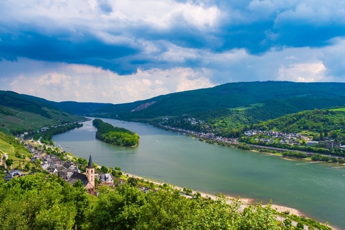 View from a hiking trail in the Rheingau Mountains near Lorch down into the Rhine Valley on a sunny spring day, Rhineland-Palatinate, Germany
