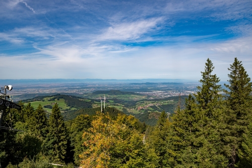 View from Schauinsland in beautiful weather over Freiburg to the Vosges Mountains, Baden-Wuerttemberg state, The Black Forest, Germany