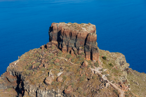 Skaros rock in Santorini against blue sea as a background, Cyclades Islands, Greece