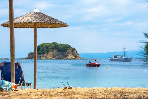 The view from Troulos Beach and its facilities on the Island of Skiathos, Sporades Islands, Greece