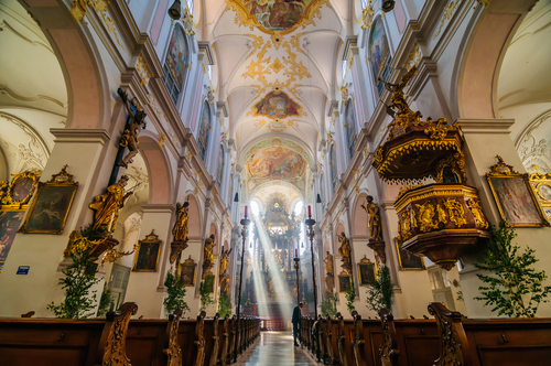 A dramatic ray of light shines through windows in St. Peter's Church (Peterskirche), Munich, Bavaria, Germany