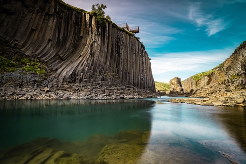 Amazing view of Stuðlagil Canyon, a turquoise waters river between basalt columns in north Iceland