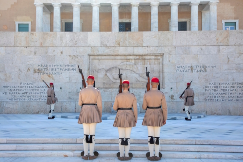 Greece Syntagma Square changing of the guard in front of the monument to the unknown. Presidential guard in traditional uniform are marching in front of Tomb of Unknown Soldier in Athens, Greece