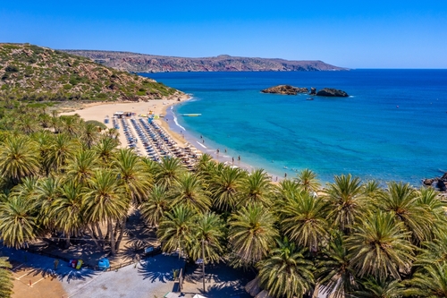 Beautiful view of Vai Beach and its Palm grove including the facilities at the beach, Agios Nikolaos, Lasithi, Island of Crete, Greece