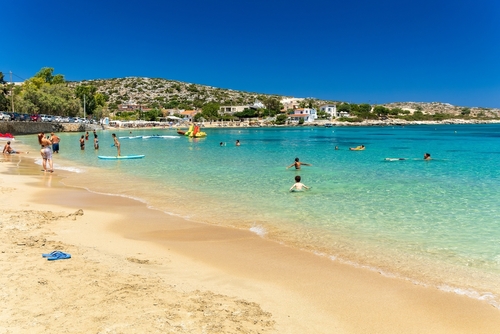 View of a beautiful sandy beach and clear shallow waters of Marathi Bay beach near Chania, Island of Crete, Greece