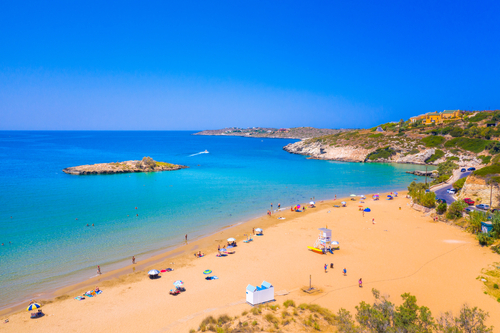 View of the Sandy beach of Kalathas with the picturesque islet Akrotiri near Chania, Island of Crete, Greece