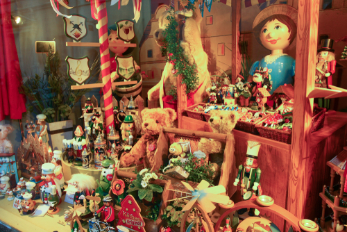 Shop display with dolls and trinkets at the Christmas museum Kathe Wohlfahrt's Christmas Weihnachtdorf in Rothenburg on the Tauber, Bavaria, Germany
