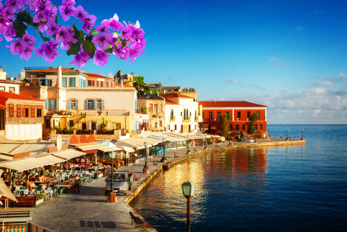 Stunning view with flowers of the bay of Chania on a Sunny Summer day, Island of Crete, Greece
