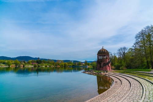 View of the city park seepark silent water in spring, a beautiful nature landscape, Freiburg im Breisgau, Baden-Wuerttemberg state, The Black Forest, Germany
