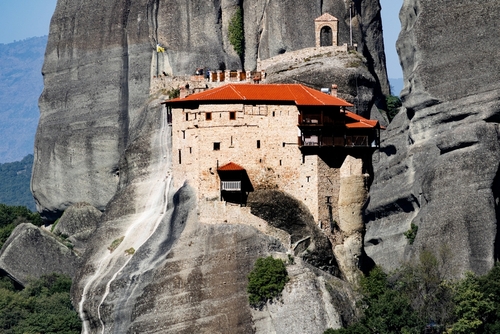 Close view of Monastery of Agios Nikolaos Anapafsas built on the steep rocks of Meteora, Kalampaka, Trikala, Thessaly, Greece