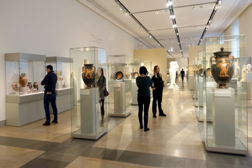 Visitors in the Antiquities rooms of the Altes Museum, one of the five museums in the Museumsinsel complex and a UNESCO World Heritage Site in Berlin, Germany