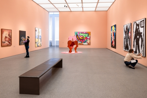 People taking photos of artwork inside the Pinakothek der Moderne in Munich, Bavaria, Germany