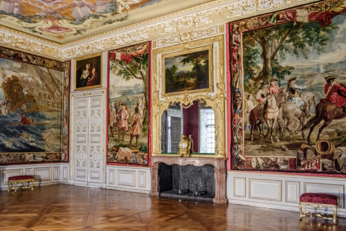 Luxury interior of Antechamber in the Electors Apartment in Schleissheim Schloss near Munich, Bavaria, Germany. The tapestries, in splendid colours and with attention to detail, depict war episodes