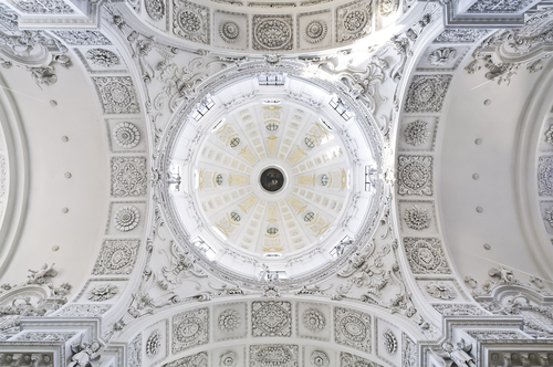 Interior view of the dome at the Theatinerkirche (Theatine Church of St. Cajetan). The church was designed in Italian high-Baroque style by architect Agostino Barelli and built in 1663-1690 in Munich, Bavaria, Germany