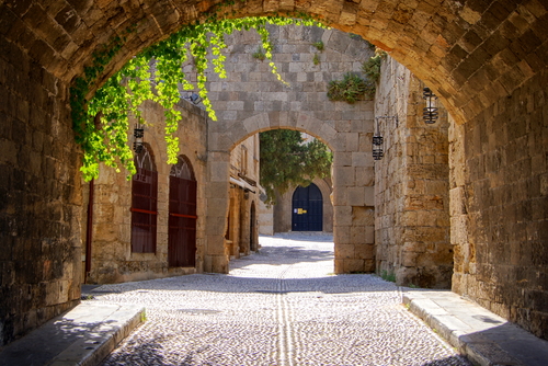 View of a medieval arched street in the old town of Rhodes, Island of Rhodes, Greece