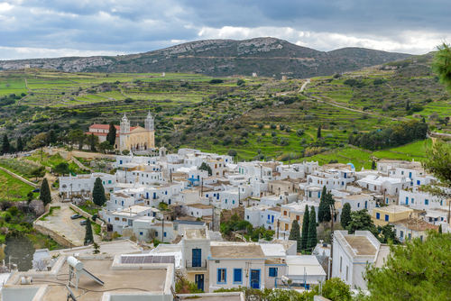 Traditional architecture with Cycladic whitewashed houses and the Christian church of Agia Triada in the traditional village Lefkes on the Island of Paros, Cyclades Islands, Greece