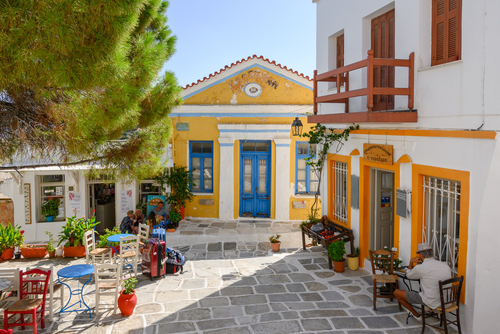 Small colorful square in Lefkes village on Paros Island, Cyclades Islands, Greece
