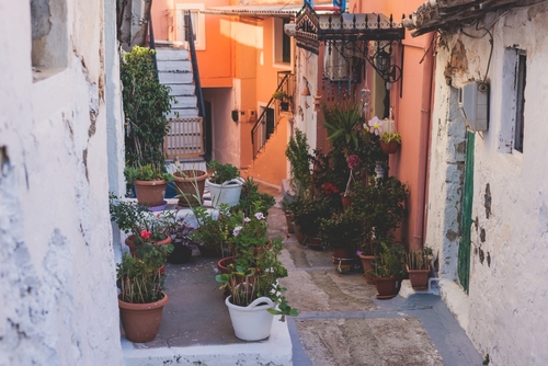 Beautiful view of Lakones streets and houses, traditional greek village near Paleokastritsa, Corfu Island, Kerkyra, Ionian sea islands, Greece, on a Summer sunny day