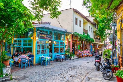 View of a narrow street with colorful houses in the old town of Thessaloniki, Greece