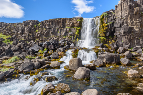 Beautiful view of Oxararfoss waterfall in Summer, Thingvellir National Park, Golden Circle, Iceland